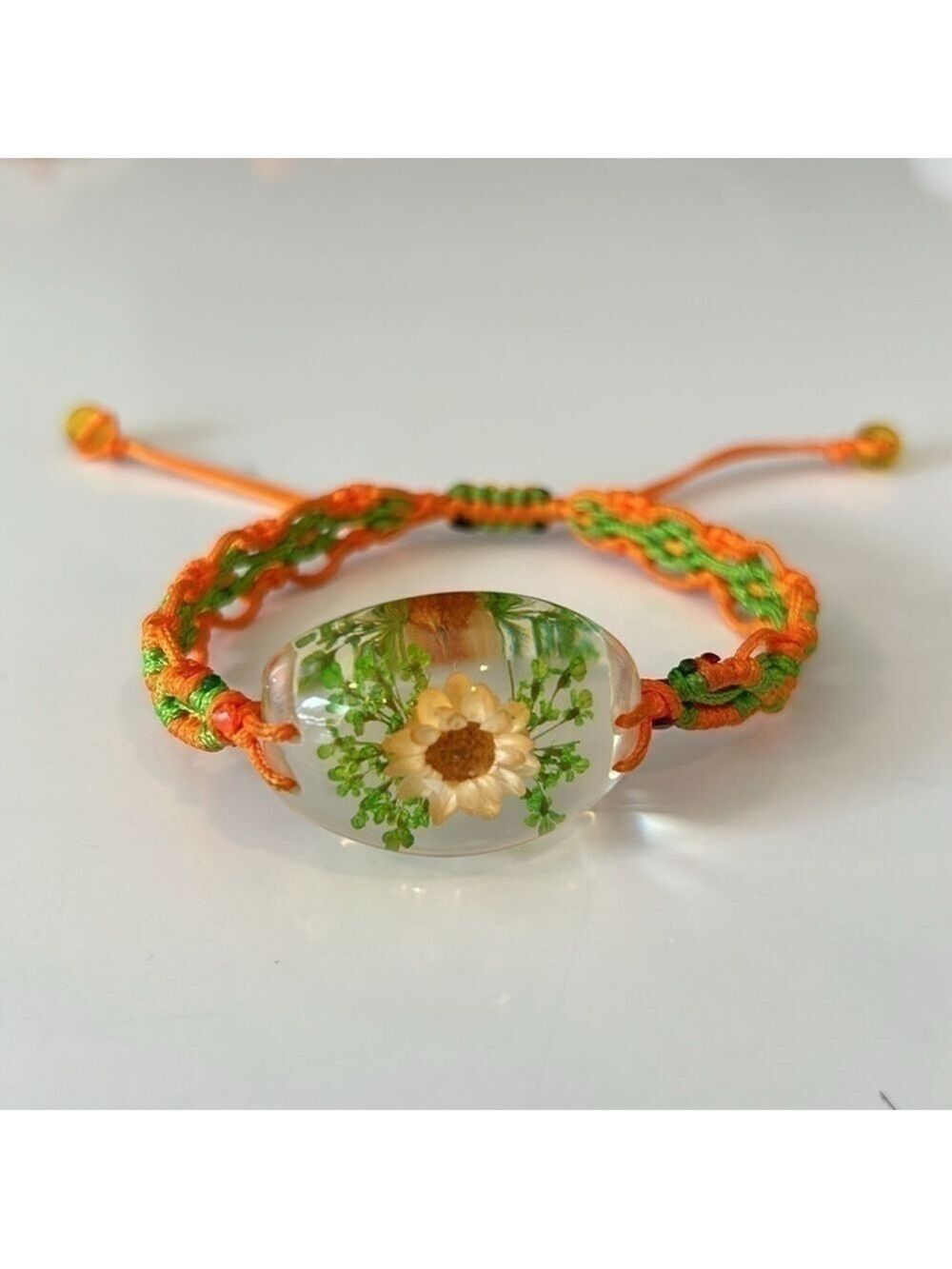 Orange and Green String Bracelet with Flower in Glass Element